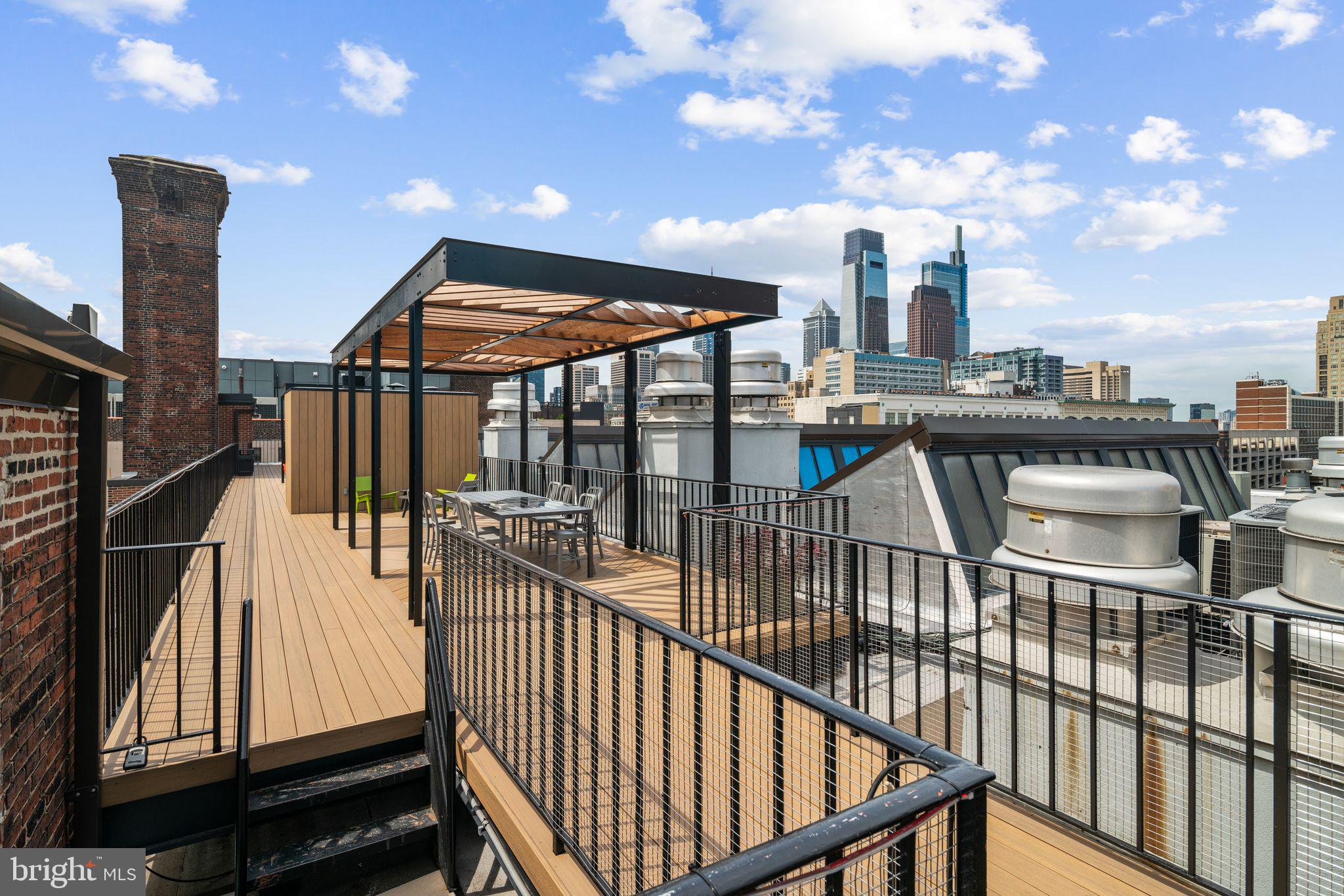 1238 Callowhill Street, Unit 101 Philadelphia, PA 19123 - Photo 16 of 17 a view of a balcony with furniture