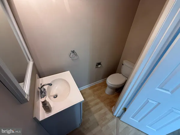 a bathroom with a toilet and a sink