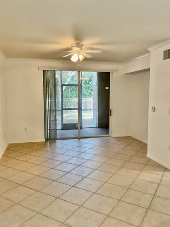 a view of an empty room and window