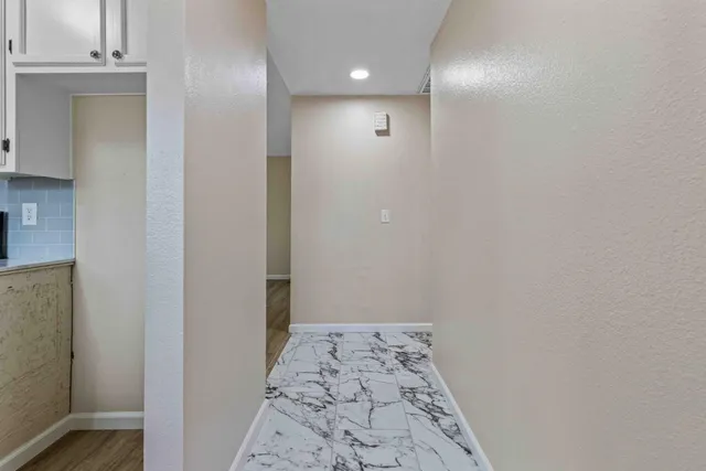 a kitchen sink with granite countertop a sink and garden