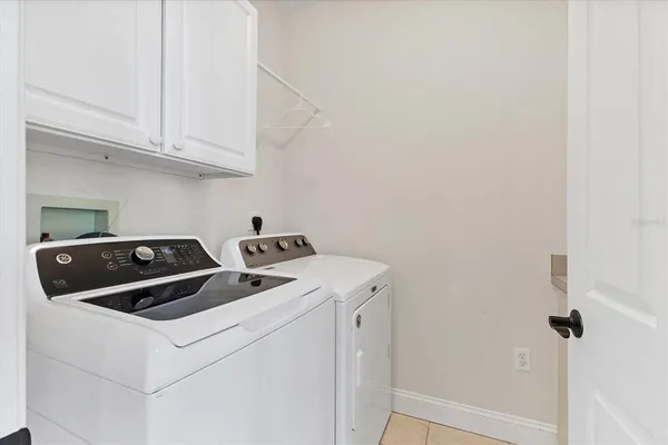 a view of a street with cars