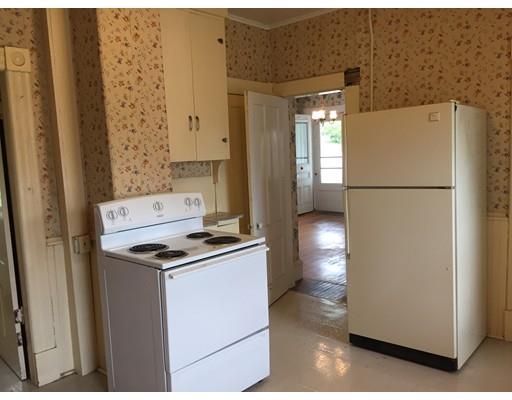 5 Pleasant Street Monson, MA 01057 - Photo 12 of 17 a view of a refrigerator in kitchen and a stove