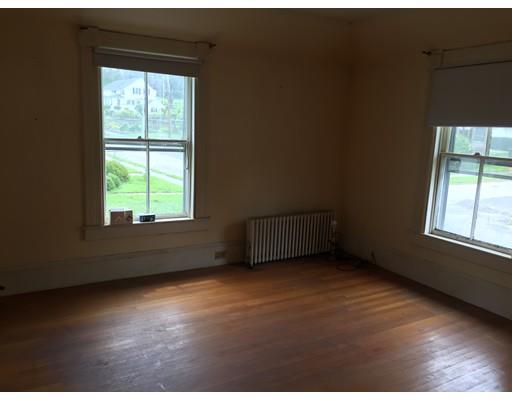 5 Pleasant Street Monson, MA 01057 - Photo 14 of 17 an empty room with wooden floor and windows