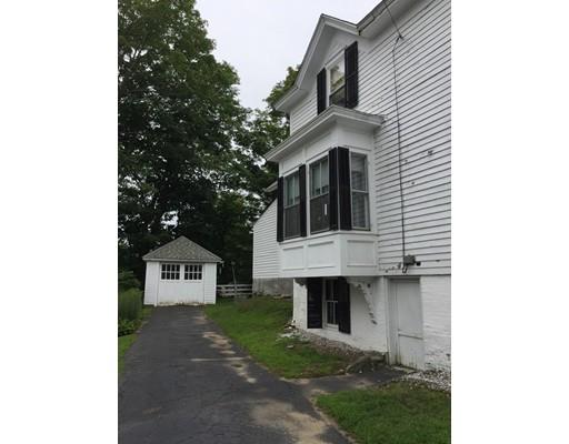 5 Pleasant Street Monson, MA 01057 - Photo 5 of 17 a front view of a house with garage