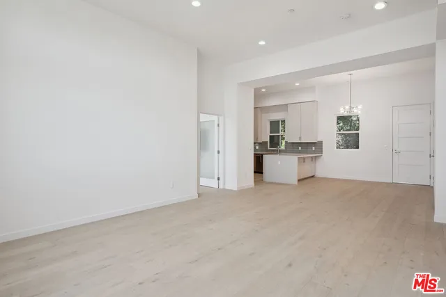 a view of a kitchen with a sink