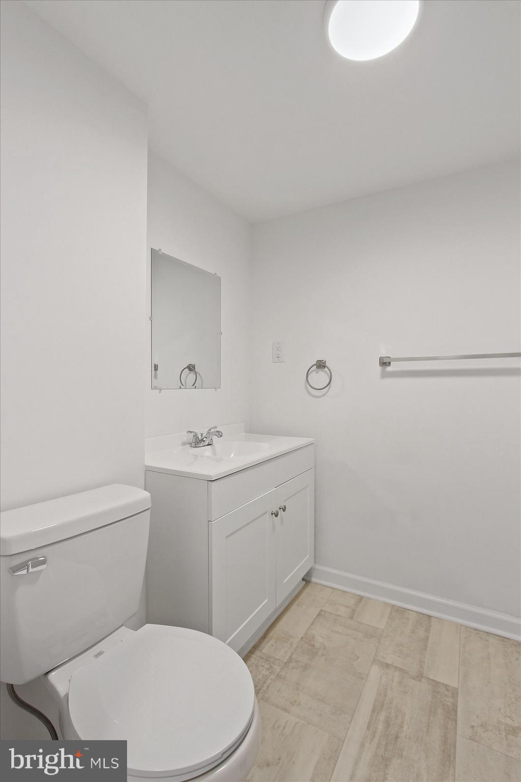 534 Hunterstown Road Gettysburg, PA 17325 - Photo 9 of 18 a bathroom with a sink a toilet and mirror