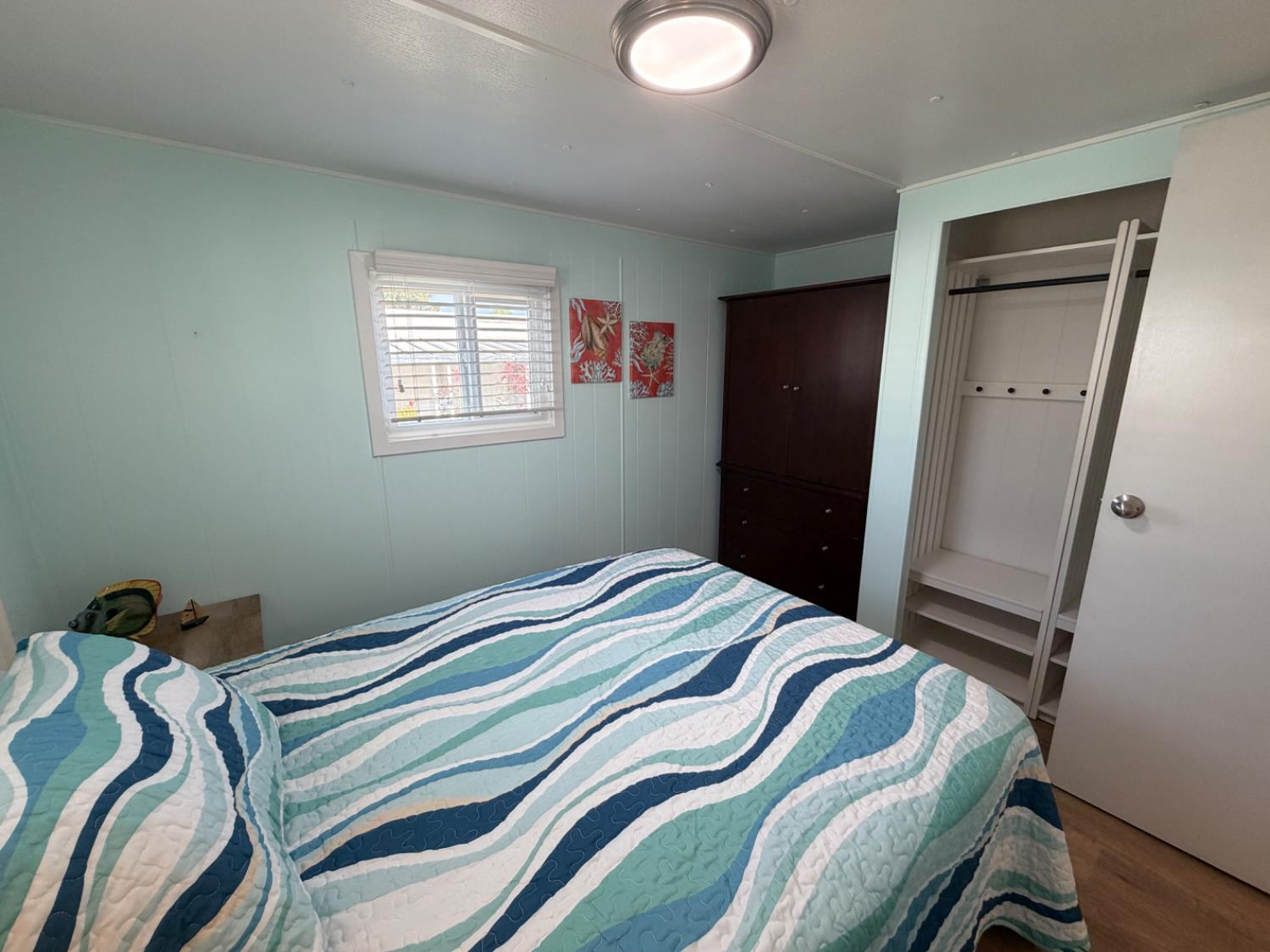 9060 Auburn Folsom Road, Unit 19 Granite Bay, CA 95746 - Photo 16 of 30 a bedroom with a bed and a window