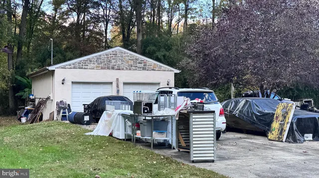 a view of a house with a sink and chairs