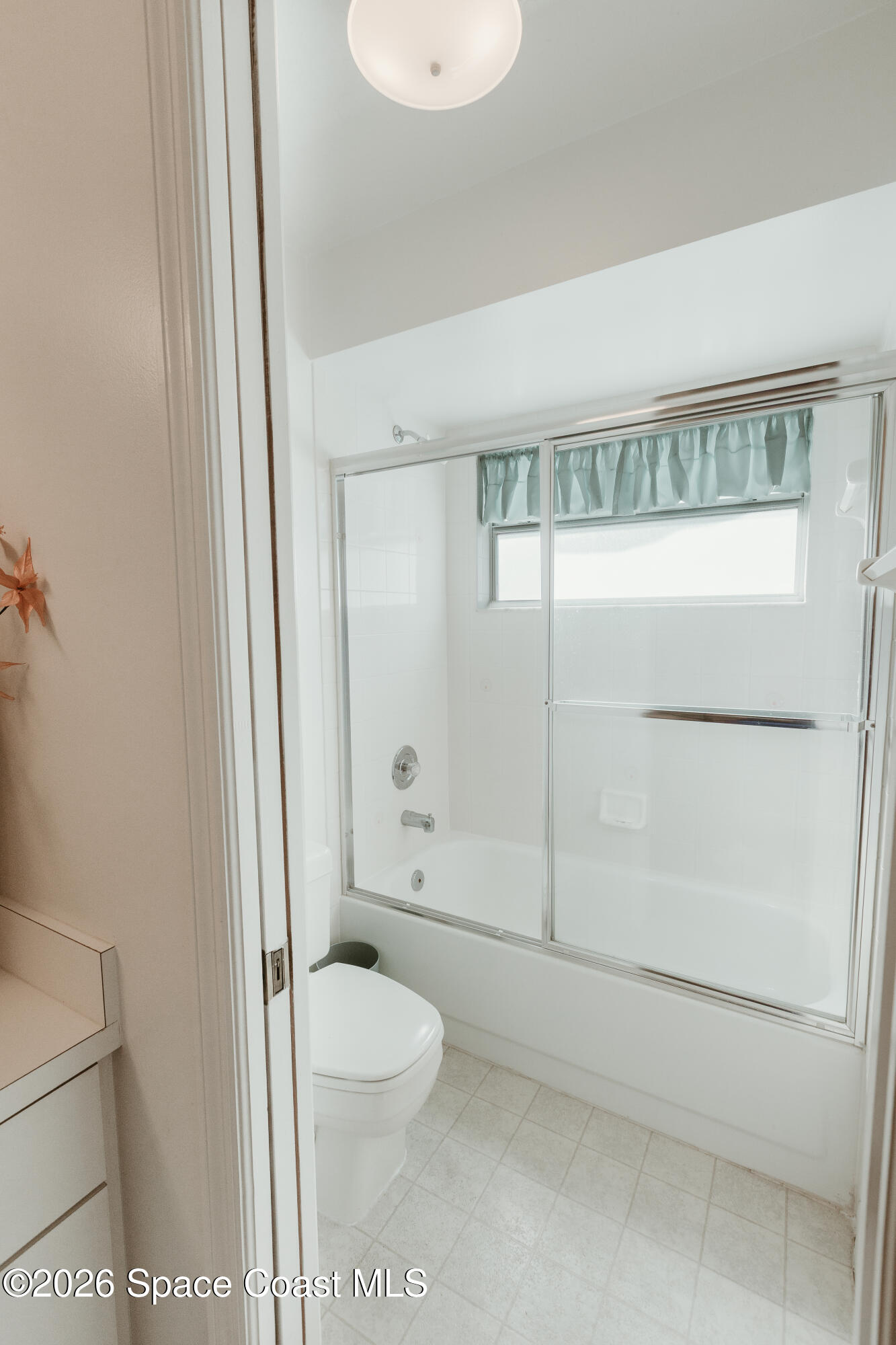 905 Maplewood Court Melbourne, FL 32940 - Photo 16 of 23 a bathroom with a toilet a sink and shower