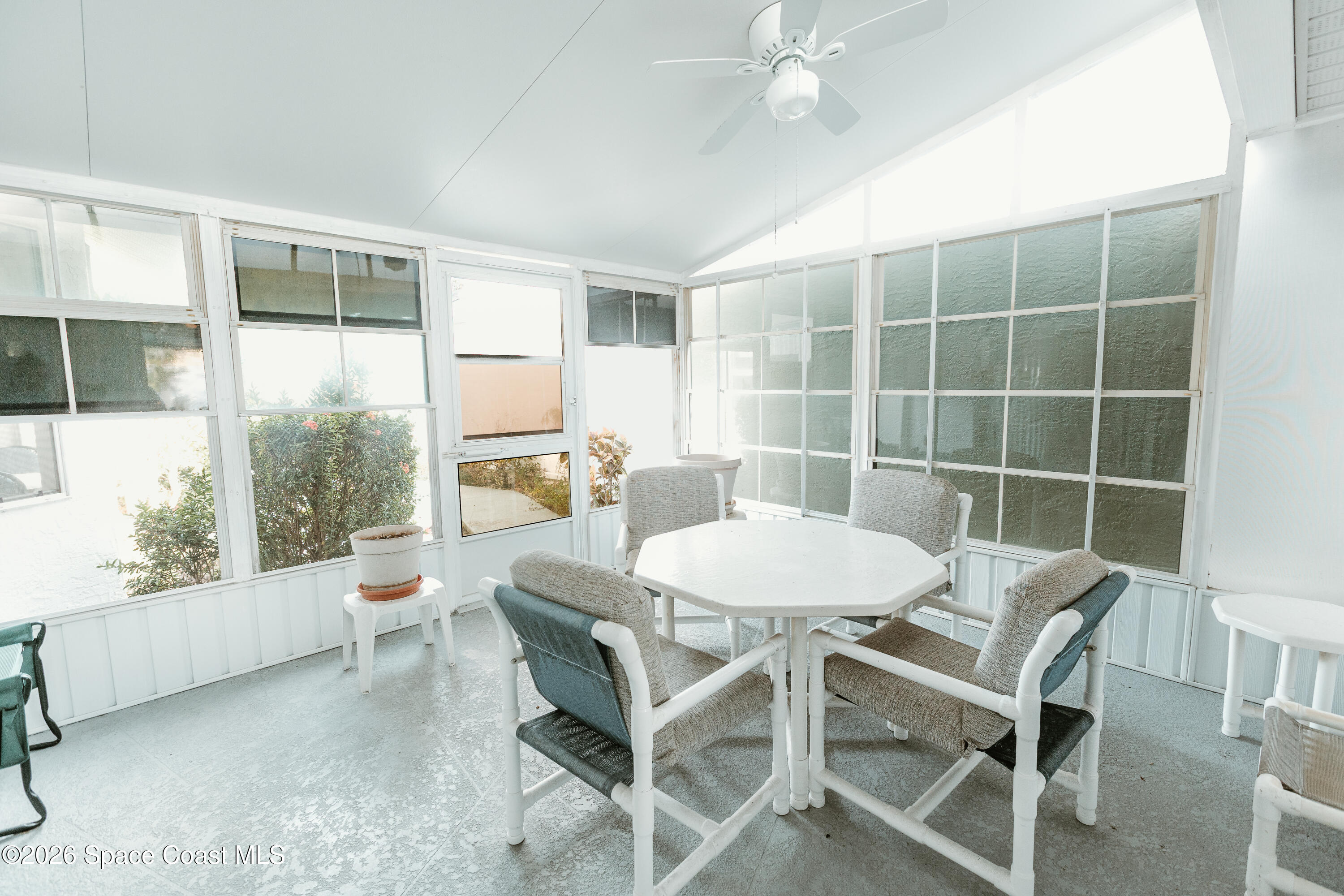 905 Maplewood Court Melbourne, FL 32940 - Photo 17 of 23 a view of a dining room with furniture window and outside view