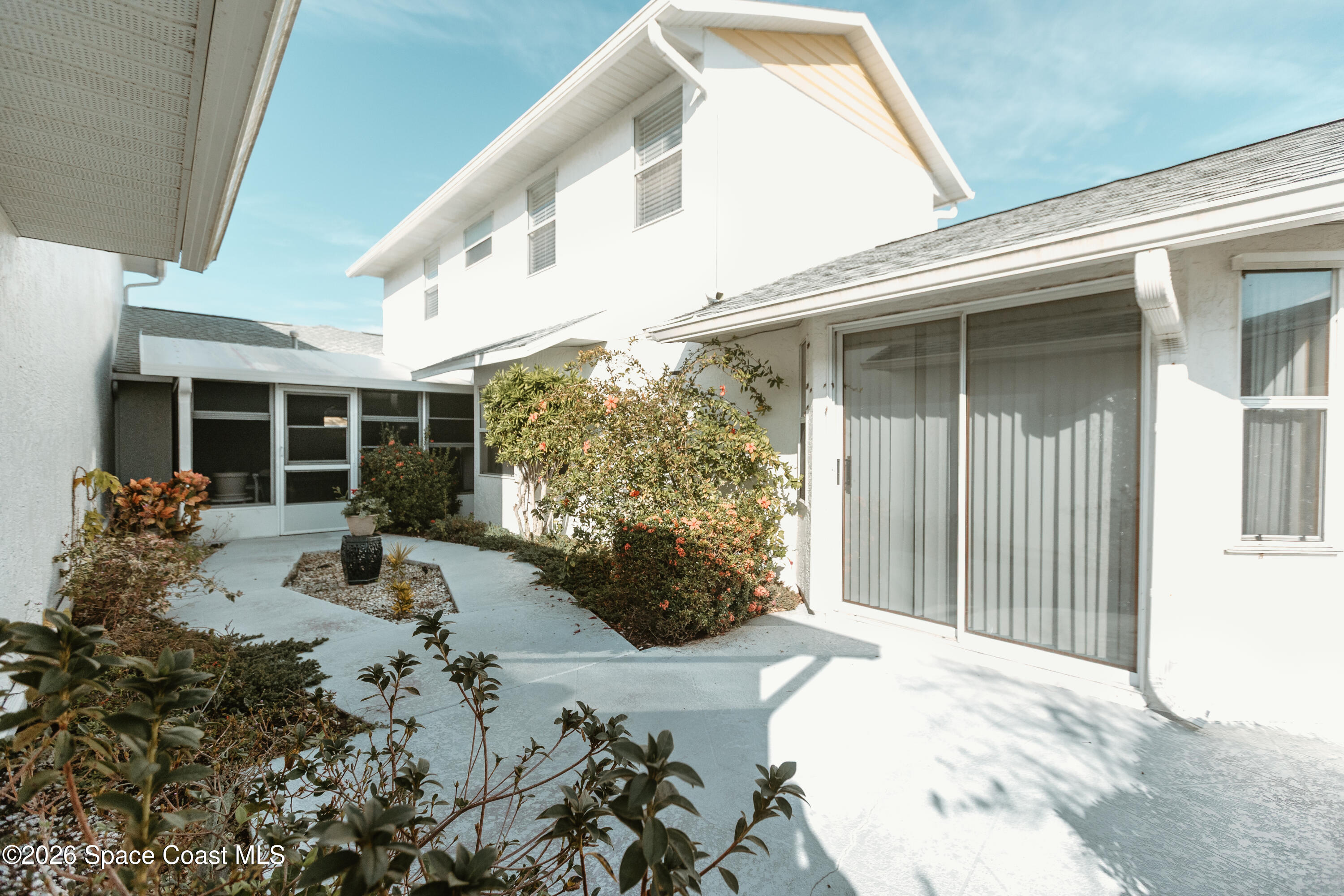 905 Maplewood Court Melbourne, FL 32940 - Photo 18 of 23 a view of a entryway door front of house
