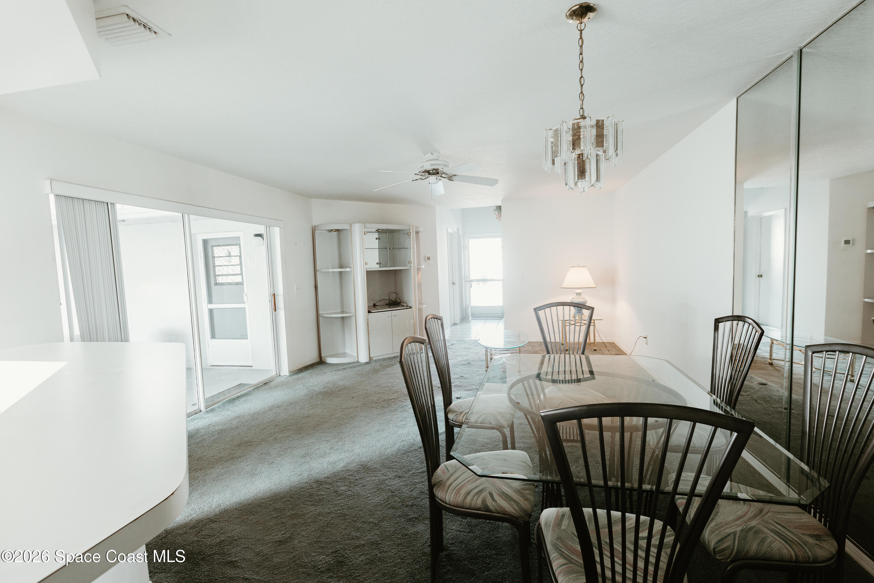 905 Maplewood Court Melbourne, FL 32940 - Photo 6 of 23 a view of a dining room with furniture