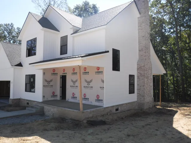 a view of a house with a street