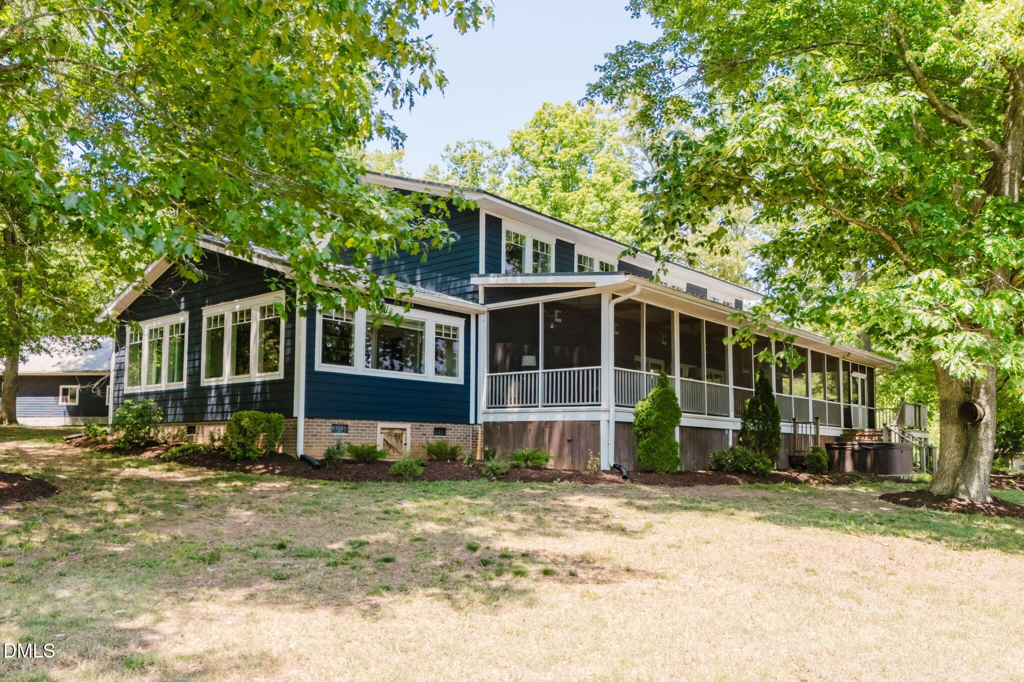370 Robinson Ferry Road Macon, NC 27551 - Photo 54 of 85 a view of a house with a yard
