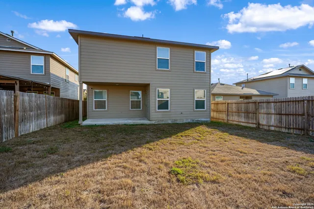 a view of backyard of house