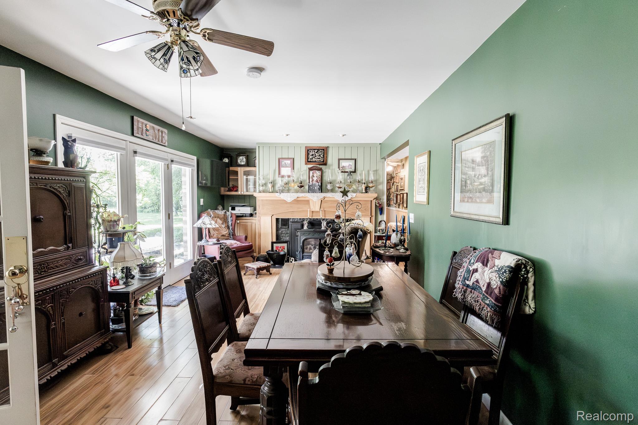 8197 Irish Road Millington, MI 48746 - Photo 16 of 38 Wood-finish flooring extending throughout the space