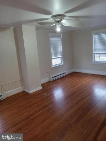 a view of livingroom with hardwood floor and window