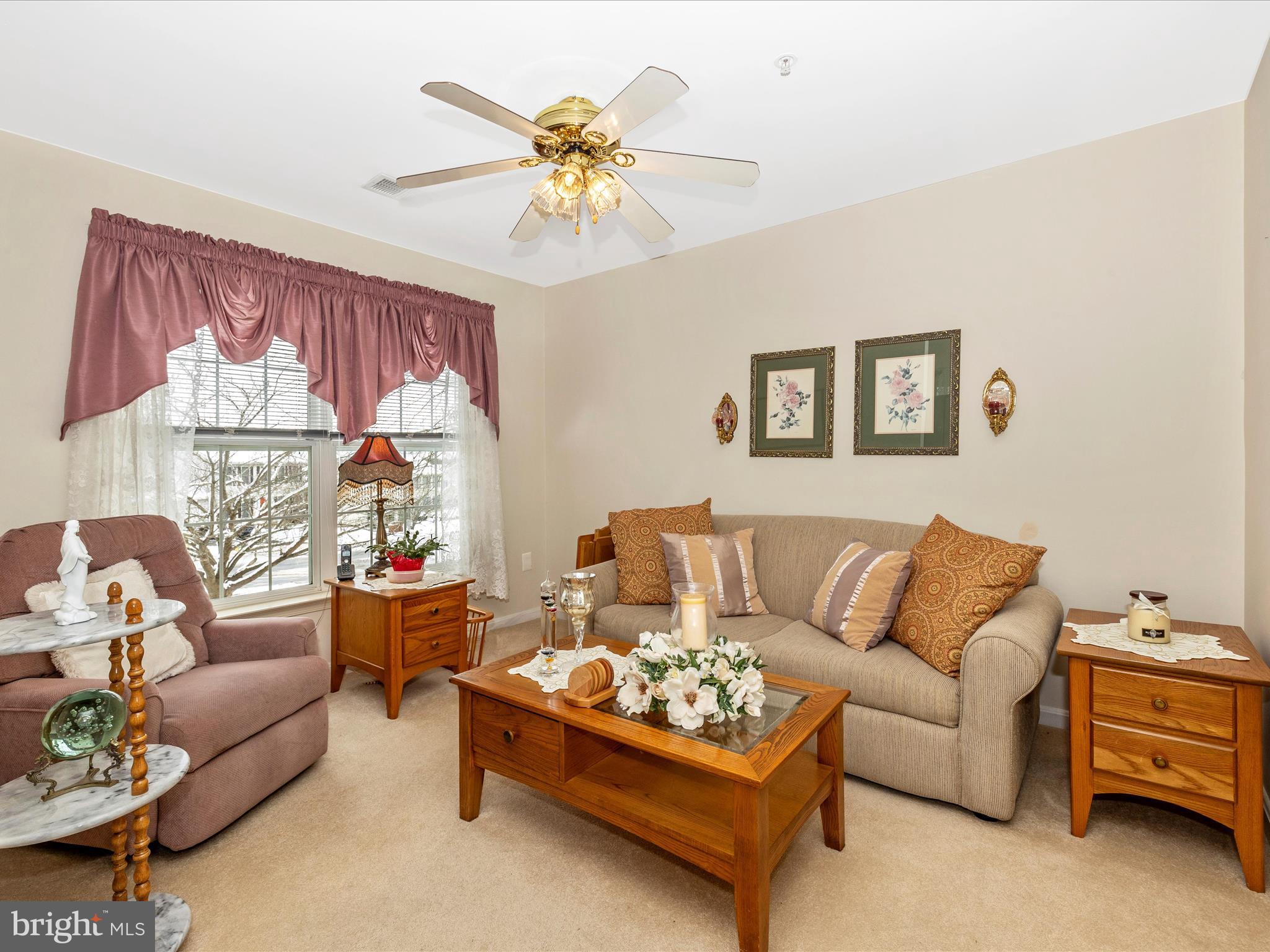 2501 Coach House Way, Unit 2C Frederick, MD 21702 - Photo 18 of 54 a living room with furniture and a chandelier