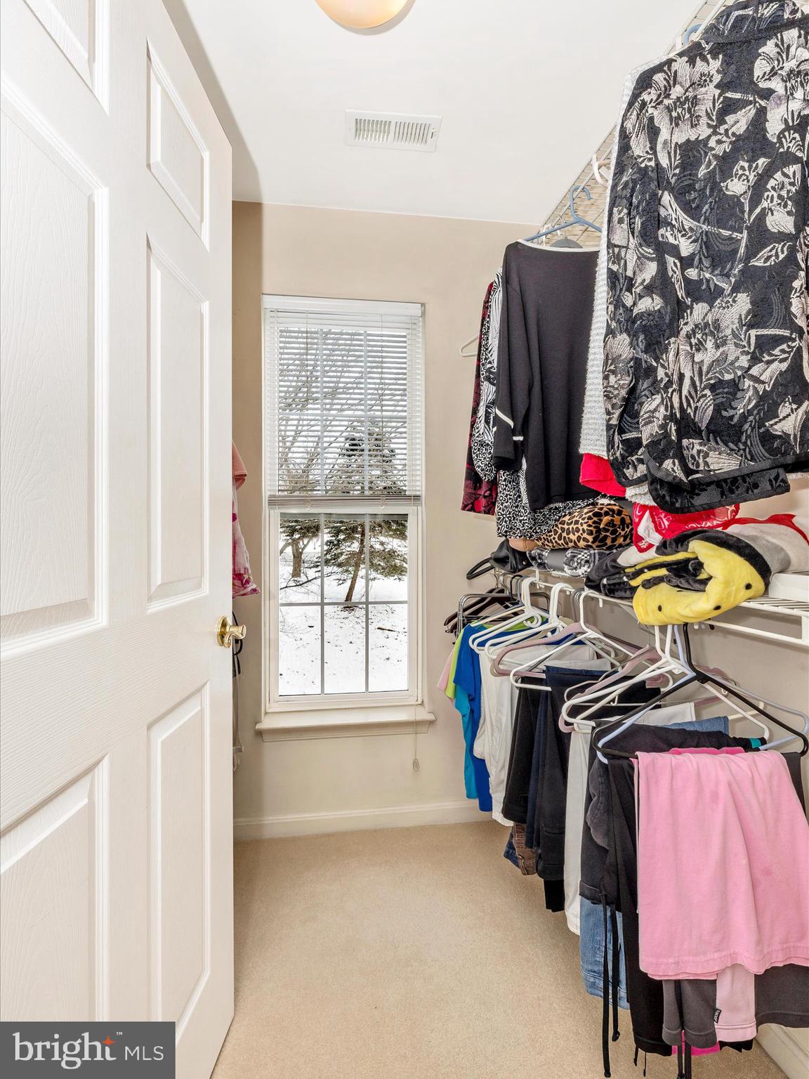 2501 Coach House Way, Unit 2C Frederick, MD 21702 - Photo 30 of 54 a view of walk in closet with clothes and shoes