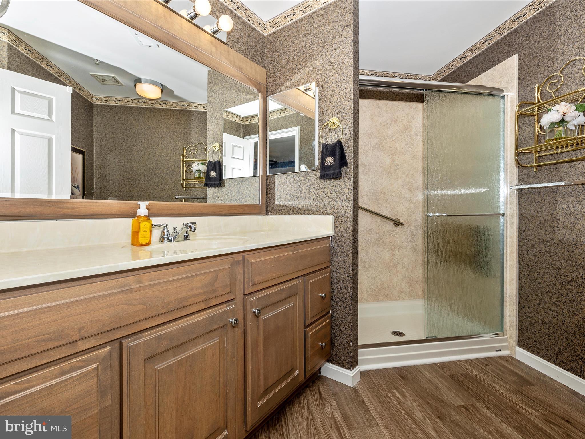 2501 Coach House Way, Unit 2C Frederick, MD 21702 - Photo 31 of 54 a bathroom with a shower and a sink