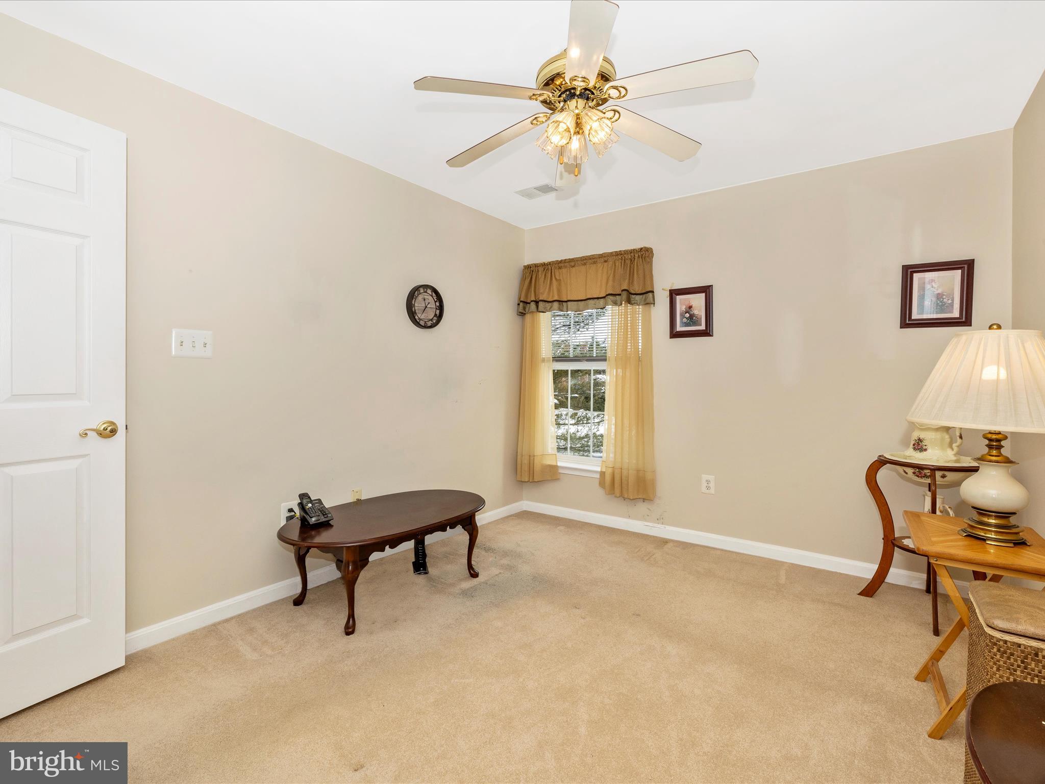 2501 Coach House Way, Unit 2C Frederick, MD 21702 - Photo 33 of 54 a living room with furniture and a window