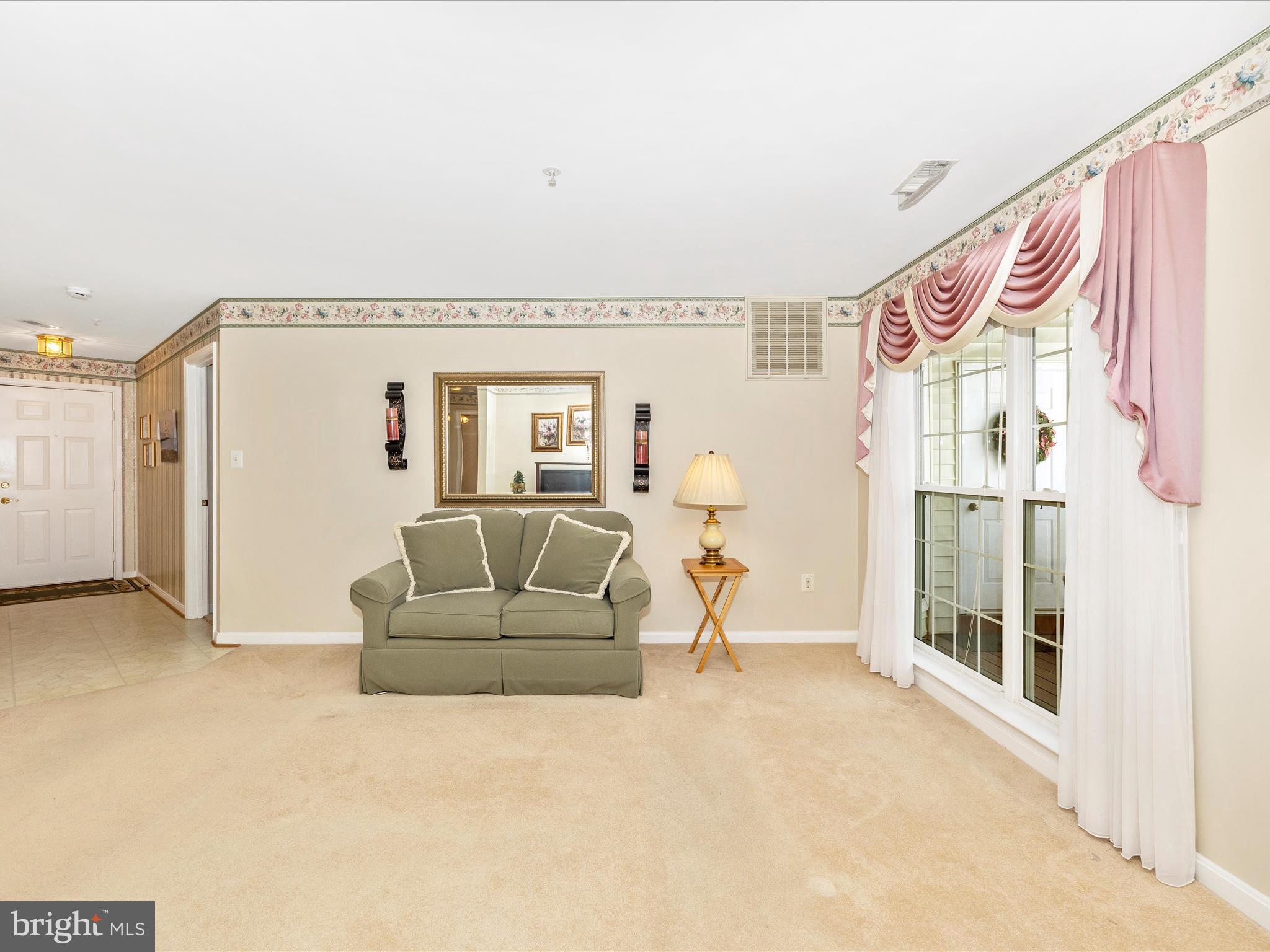 2501 Coach House Way, Unit 2C Frederick, MD 21702 - Photo 6 of 54 a living room with furniture and a window