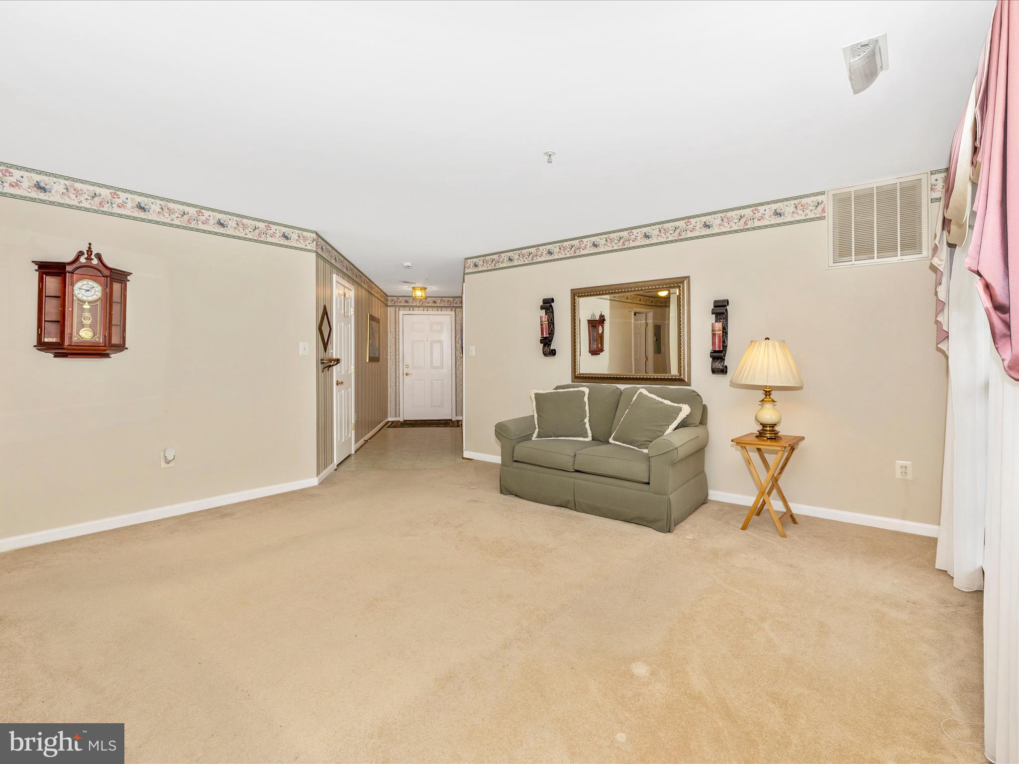 2501 Coach House Way, Unit 2C Frederick, MD 21702 - Photo 7 of 54 a living room with furniture and a window