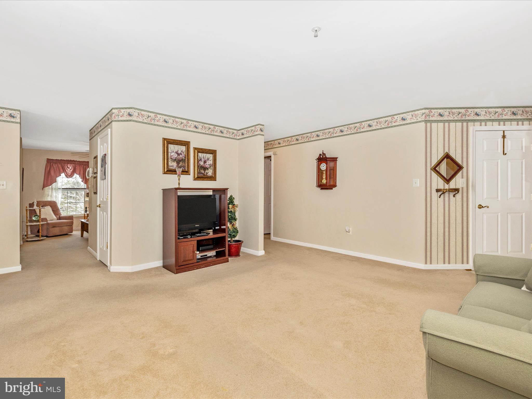 2501 Coach House Way, Unit 2C Frederick, MD 21702 - Photo 8 of 54 a view of livingroom with furniture and refrigerator