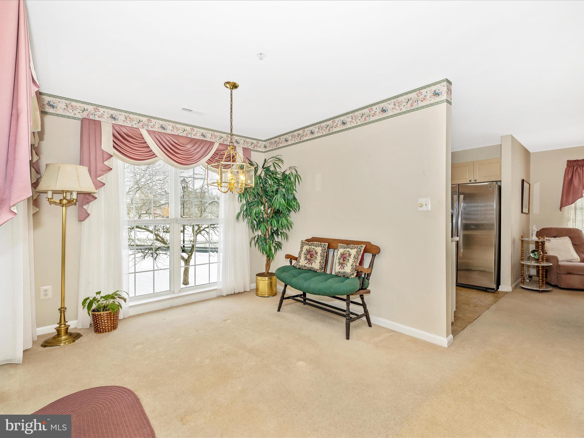 2501 Coach House Way, Unit 2C Frederick, MD 21702 - Photo 9 of 54 a bedroom with furniture and a large window