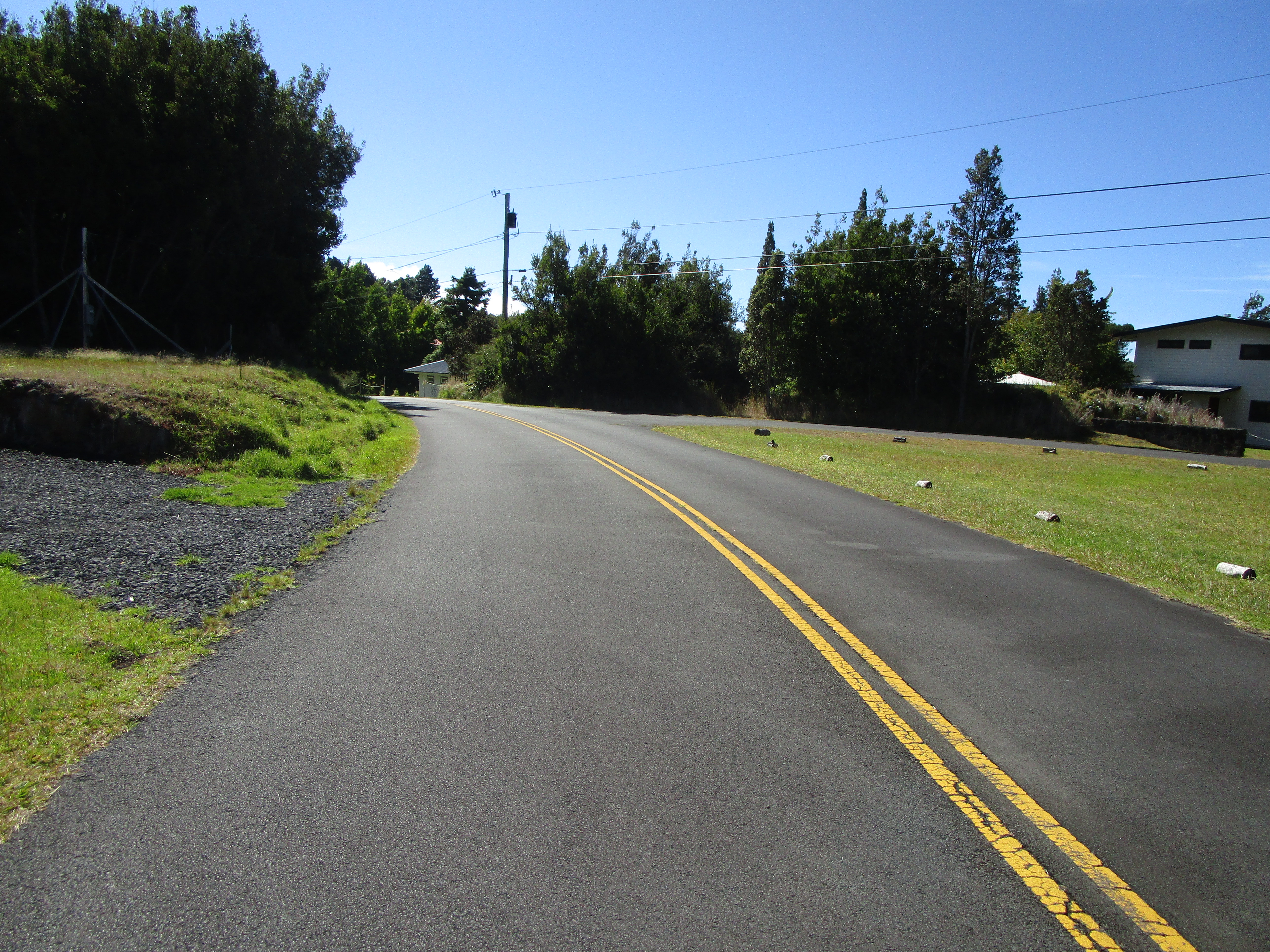 240 Pukeawe Circle Volcano, HI 96785 - Photo 3 of 3 a view of a road with a yard