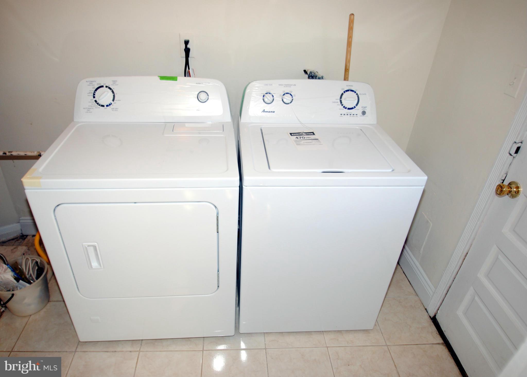 716 Milford Mill Road Baltimore, MD 21208 - Photo 17 of 19 a utility room with dryer and washer