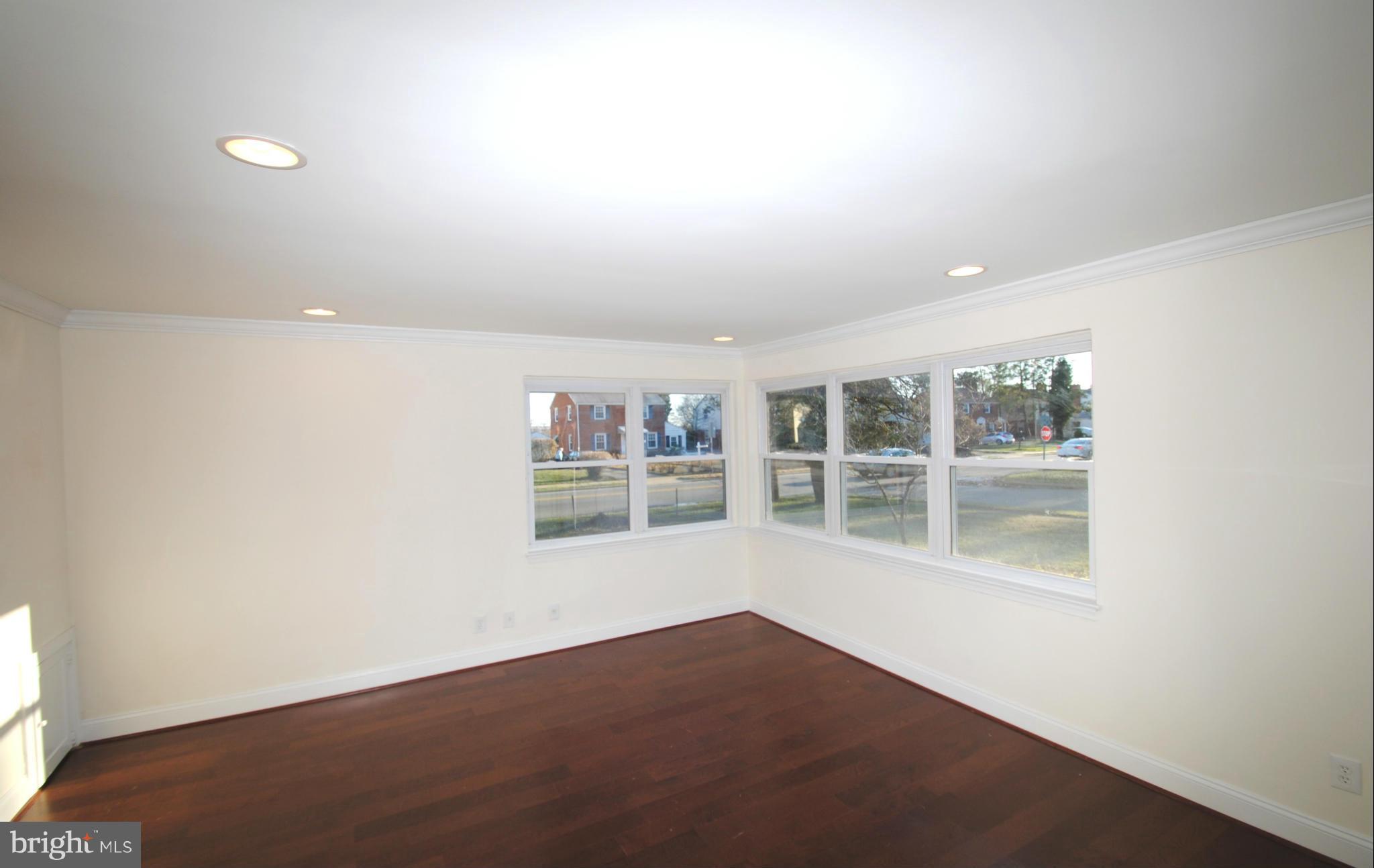 716 Milford Mill Road Baltimore, MD 21208 - Photo 5 of 19 an empty room with a window