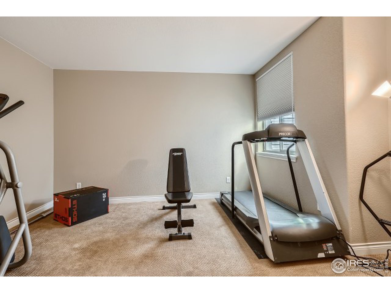 9670 Phillips Road Lafayette, CO 80026 - Photo 25 of 33 a view of a room with gym equipment