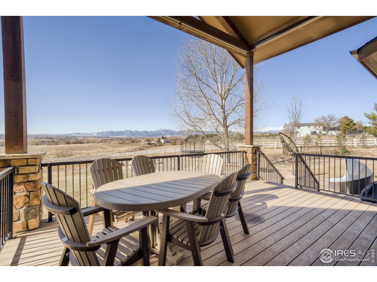 9670 Phillips Road Lafayette, CO 80026 - Photo 31 of 33 a view of a chairs and table on the roof deck