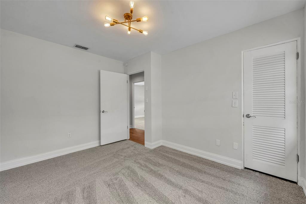 4234 Kendrick Road Orlando, FL 32804 - Photo 31 of 46 a view of empty room with ceiling fan
