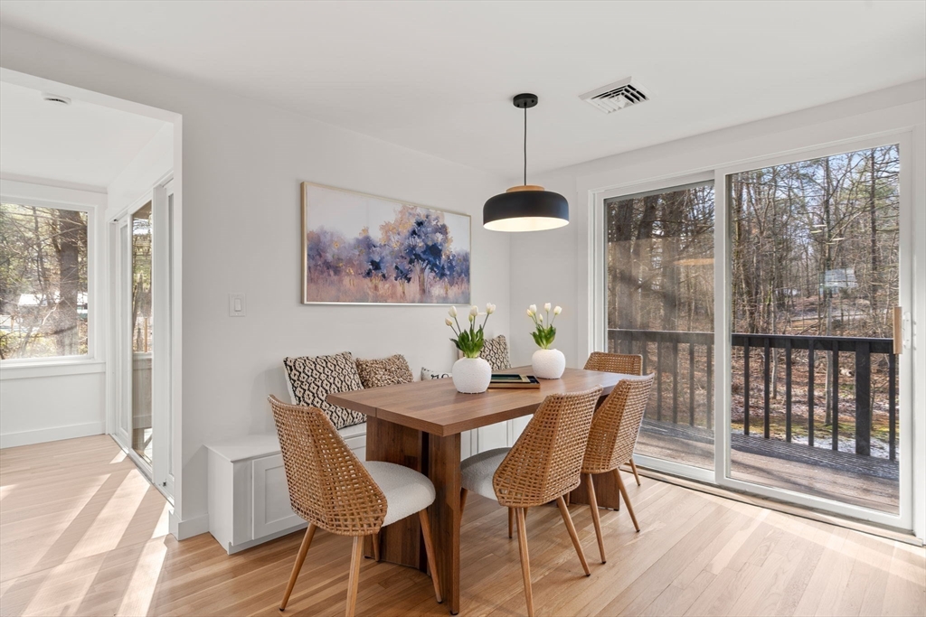 59 Tanbark Road Sudbury, MA 01776 - Photo 15 of 42 a view of a dining room with furniture window and wooden floor