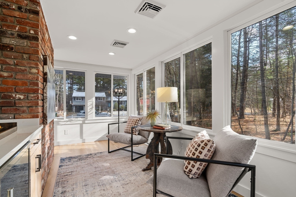 59 Tanbark Road Sudbury, MA 01776 - Photo 16 of 42 a living room with furniture and a large window