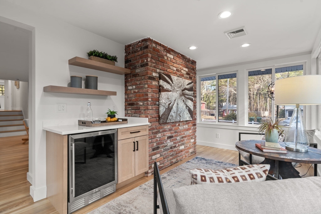 59 Tanbark Road Sudbury, MA 01776 - Photo 17 of 42 a kitchen with stainless steel appliances granite countertop a stove and a sink