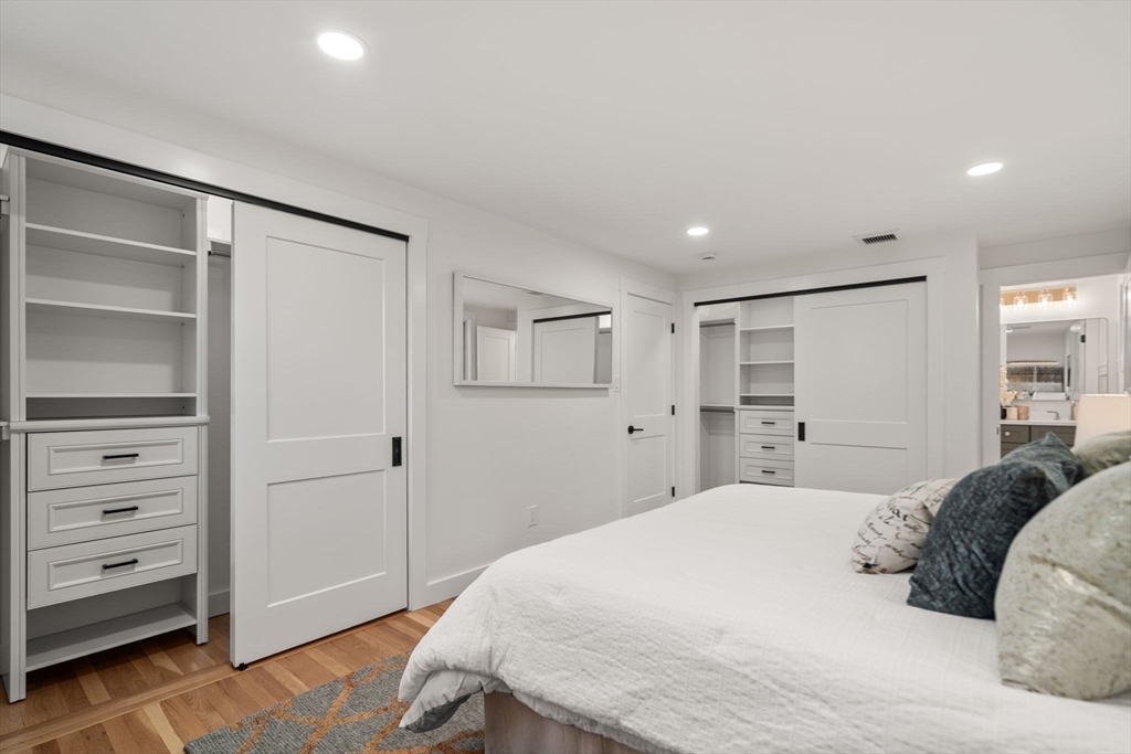 59 Tanbark Road Sudbury, MA 01776 - Photo 22 of 42 a bedroom with a bed and a window