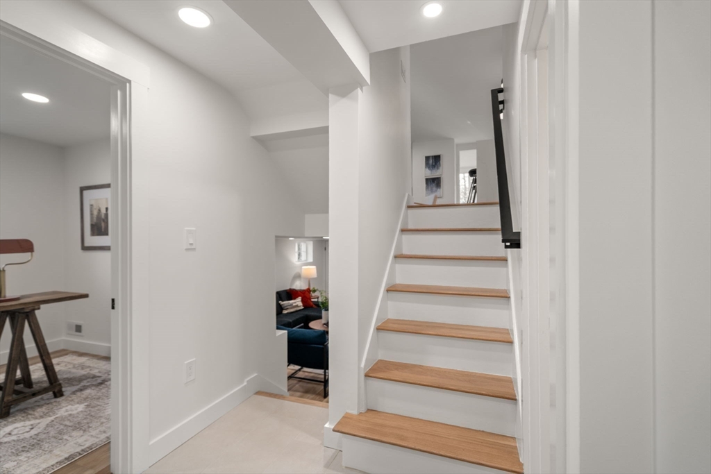 59 Tanbark Road Sudbury, MA 01776 - Photo 30 of 42 a view of staircase with white walls and windows