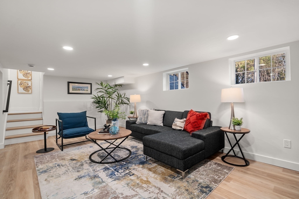 59 Tanbark Road Sudbury, MA 01776 - Photo 31 of 42 a living room with furniture or couch and a potted plant