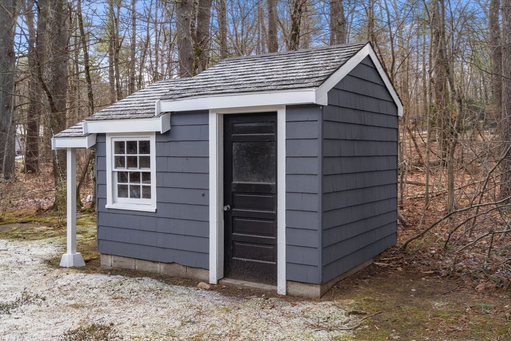59 Tanbark Road Sudbury, MA 01776 - Photo 37 of 42 a front view of a house with a yard