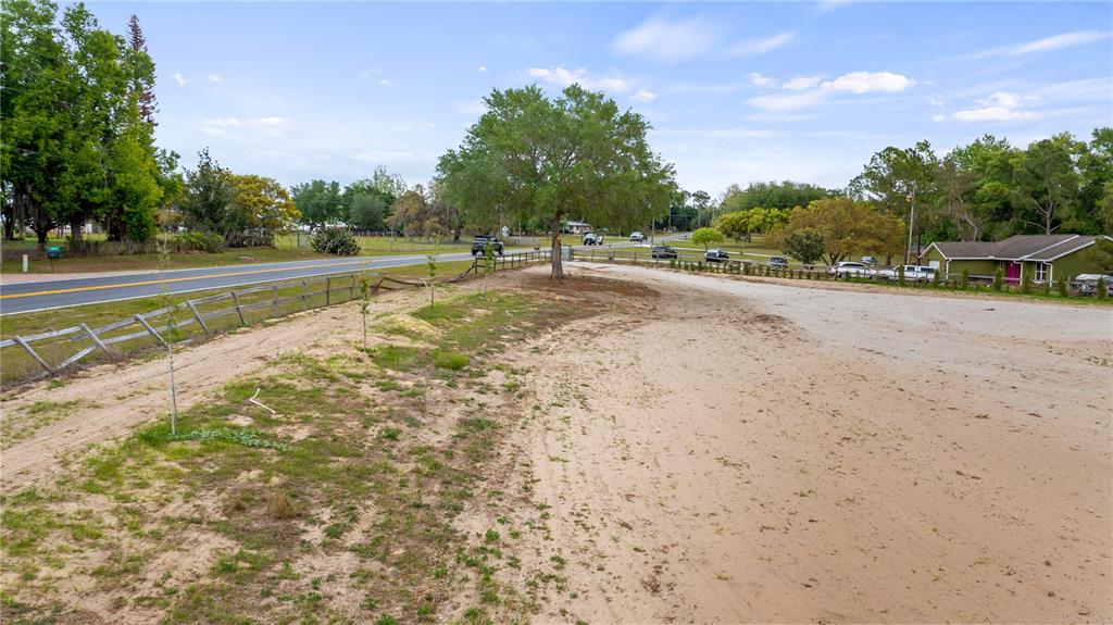 561 County Road Clermont, FL 34711 - Photo 15 of 24 a view of a road with a yard