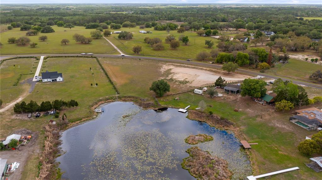 561 County Road Clermont, FL 34711 - Photo 17 of 24 an aerial view of a house with a yard