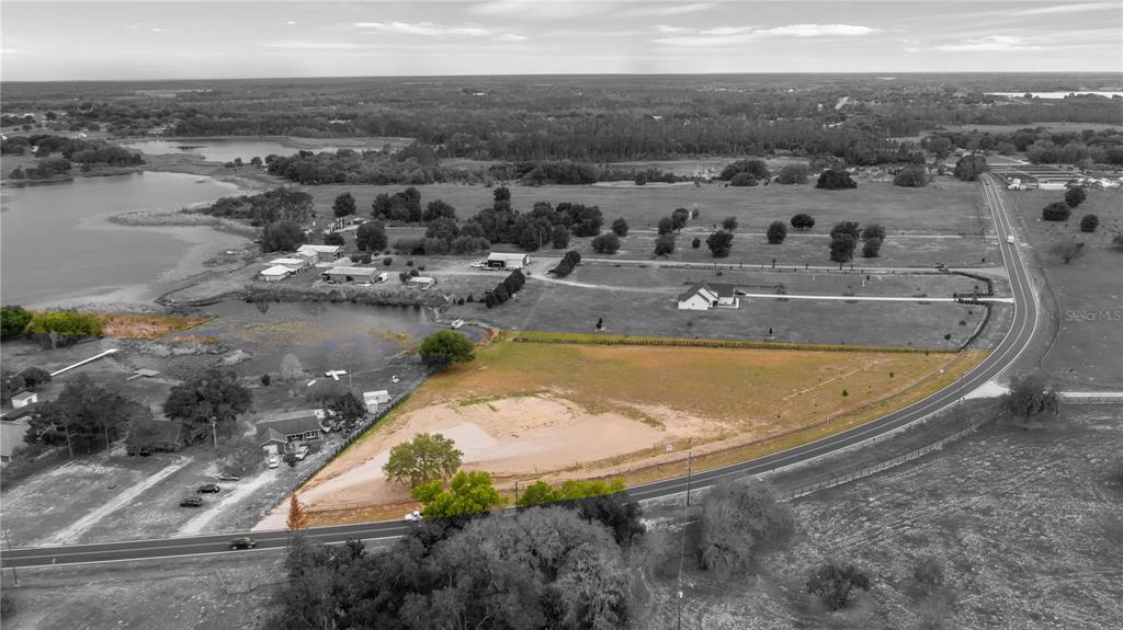 561 County Road Clermont, FL 34711 - Photo 2 of 24 a view of a swimming pool and lake view