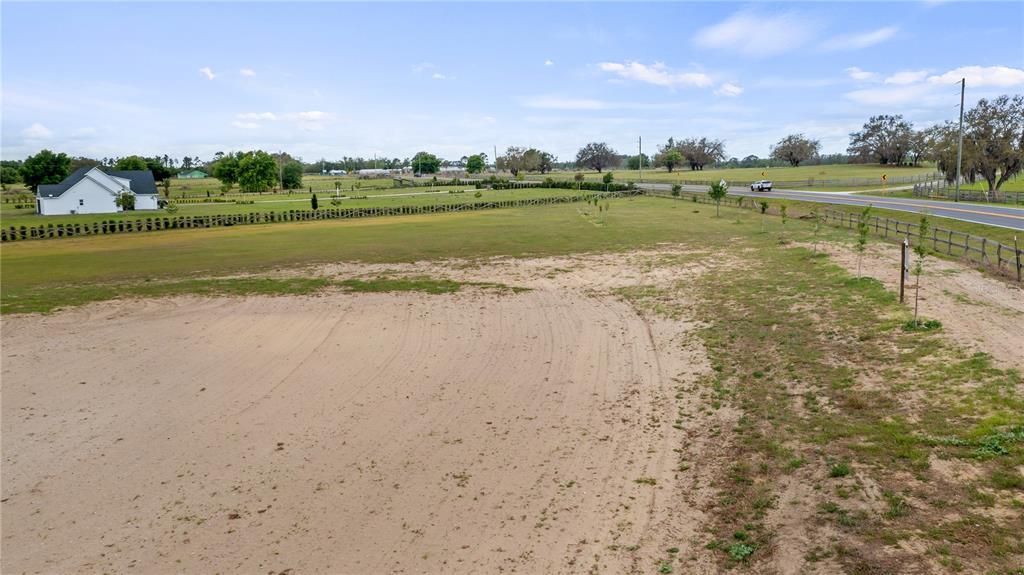 561 County Road Clermont, FL 34711 - Photo 23 of 24 a view of a lake with a yard