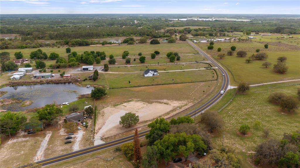 561 County Road Clermont, FL 34711 - Photo 10 of 24 an aerial view of a house with a yard