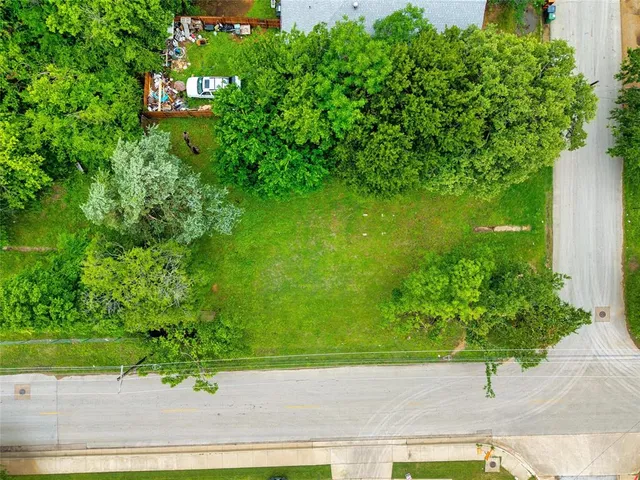 a view of a garden with a pathway
