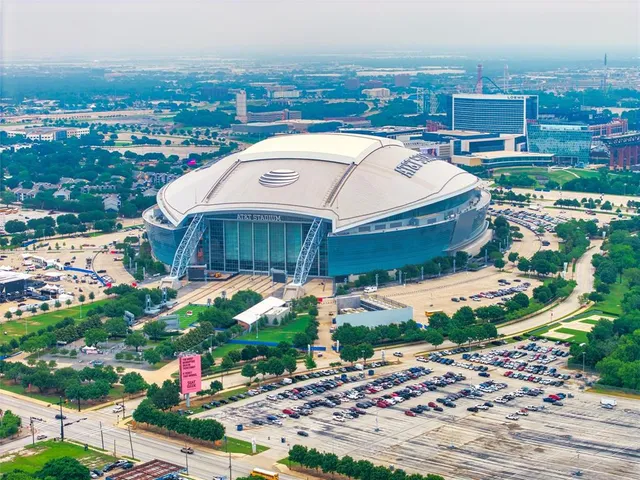 a aerial view of a house with a yard