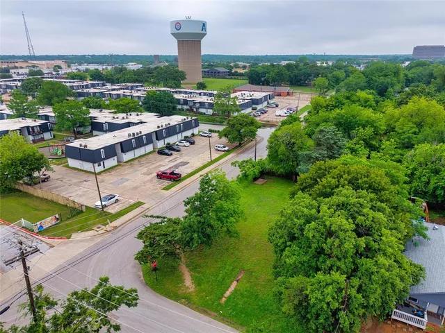 an aerial view of a city with garden